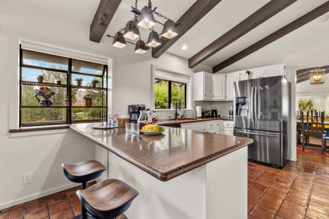 Pull up a barstool in our fully stocked kitchen!