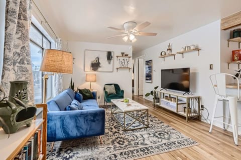 Upon entering, you`ll be greeted by a cozy living room with open floor plan leading to the kitchen.