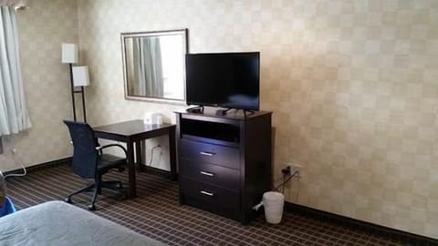 1 bedroom, laptop workspace, blackout drapes, iron/ironing board