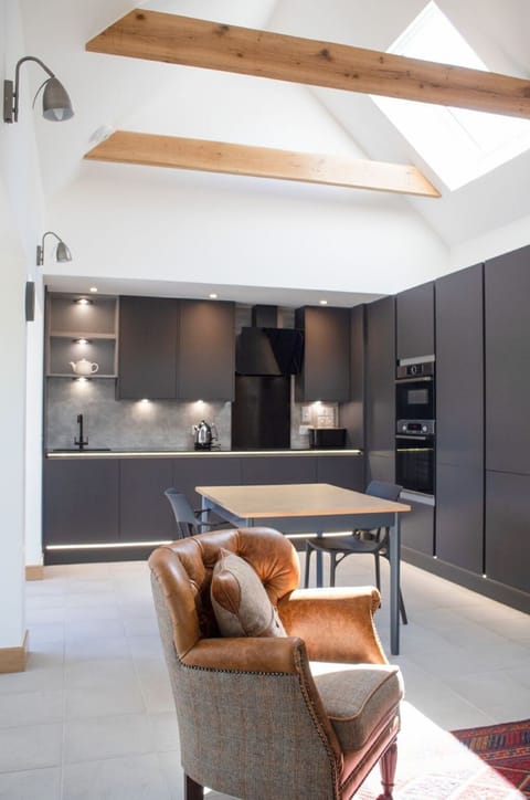 Furniture, Property, Cabinetry, Wood, Building, Interior Design, Table, Couch, Flooring, Comfort