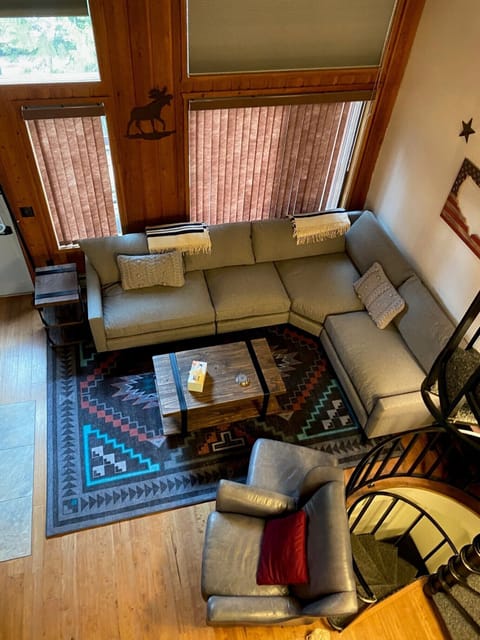 Living room with newly updated sectional and furniture