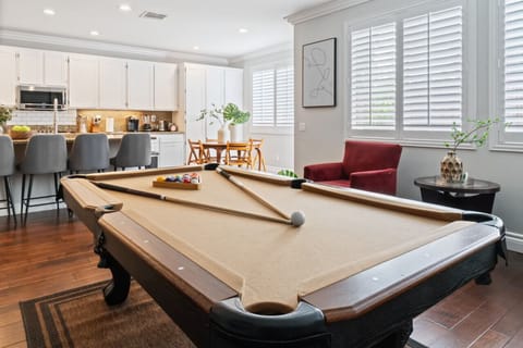 Enjoy a friendly pool game, perfect for some fun and relaxation during your stay!