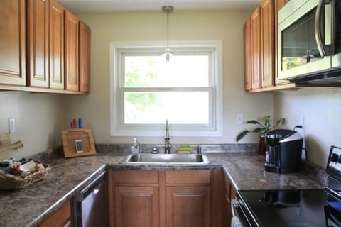 Fully equipped kitchen with all major appliances, fridge with ice maker and in-door ice and water dispenser, electric griddle, crockpot and more!