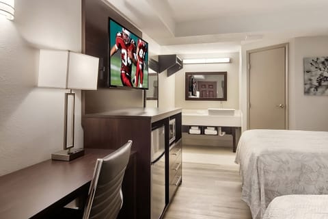 Unit with a flat-screen TV, microwave and mini-fridge