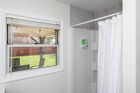 Combined shower/tub, hair dryer, towels, soap