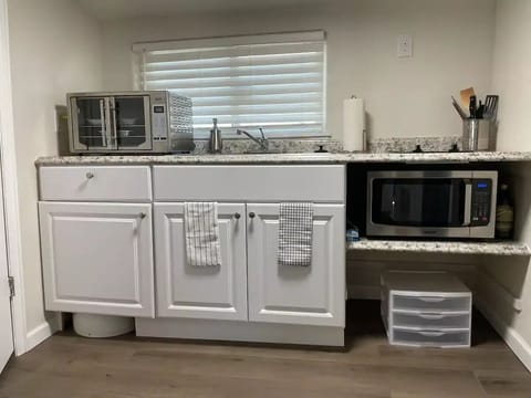 Fridge, microwave, toaster, cookware/dishes/utensils