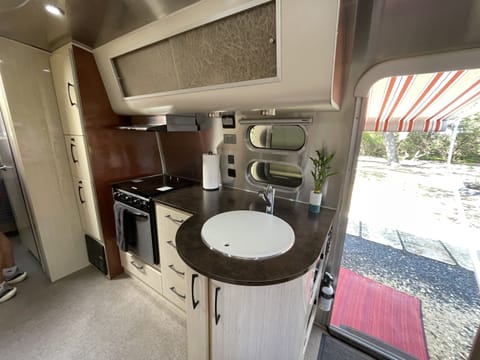 Kitchen, with a propane stove and oven.