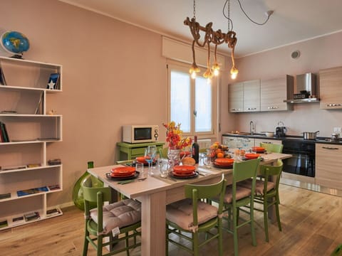 Furniture, Table, Wood, Chair, Kitchen, Interior Design, Tableware, Countertop, Orange, Living Room