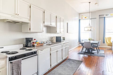 Full Kitchen includes all pots, pans, silverware, coffee maker, coffee, sugar, creamer, tea, blender, toaster, refrigerator, microwave, glasses, wine glasses and cooking/eating utensils