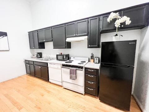 Full Kitchen includes all pots, pans, silverware, coffee maker, coffee, sugar, creamer, tea, blender, toaster, refrigerator, microwave, glasses, wine glasses and cooking/eating utensils