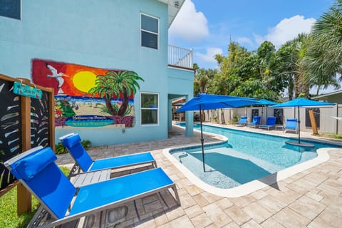 A heated pool, pool umbrellas