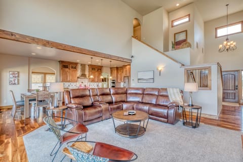 Cozy up in this beautifully furnished living room, complete with plush seating and modern décor.