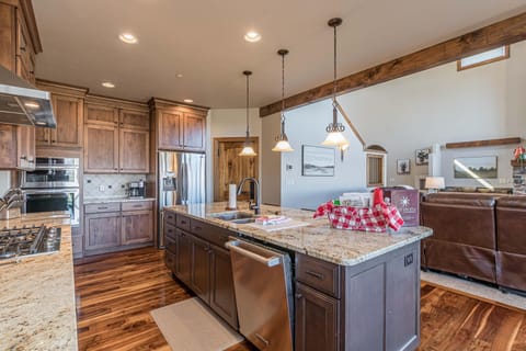 Prepare your favorite dishes in this sleek and stylish kitchen that feels like home.