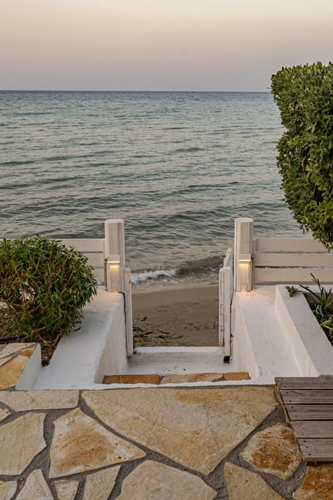 On the beach, sun loungers, beach towels