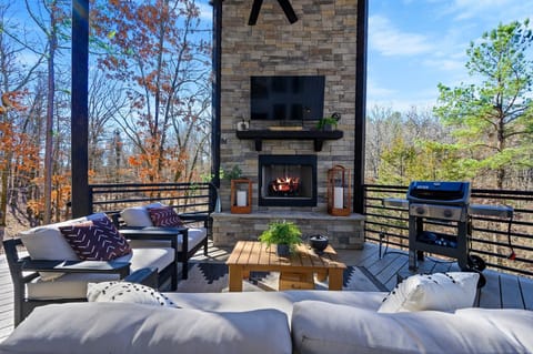 Outdoor seating to view the firplace and TV