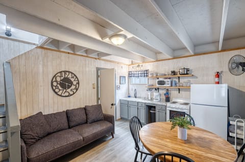 Relax on the comfy couch and watch TV.