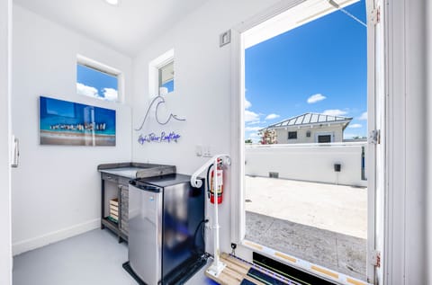 Entry to Rooftop Terrace complete with refrigerator and mini bar area.