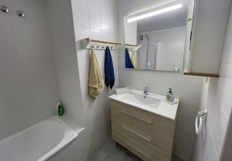 Combined shower/tub, hair dryer, towels, toilet paper