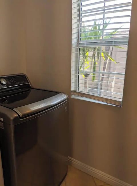 Indoor laundry has washer and dryer