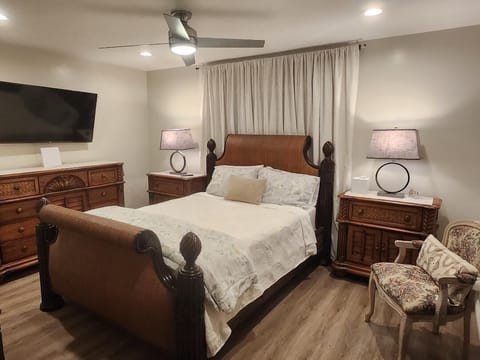 Master bedroom with quality linens and Smart TV