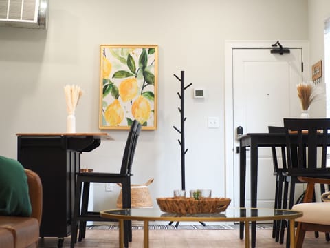 Enjoy meals together sitting up at chic cafe- style dining table.