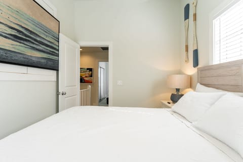 Bedroom 2 features a queen bed.