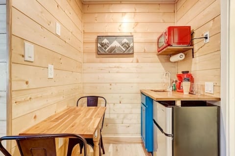 Mini-fridge, microwave, coffee/tea maker, dining tables