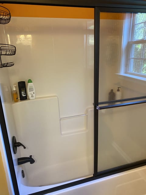 Combined shower/tub