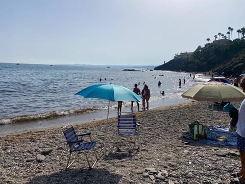 Beach nearby, sun loungers, beach towels