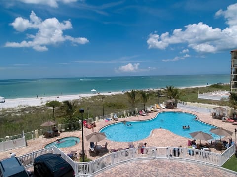 A heated pool, sun loungers