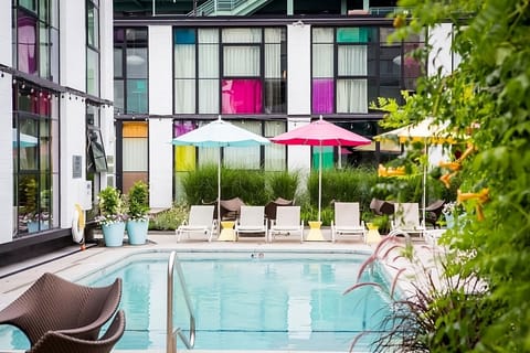 Relax by tranquil water with loungers lined in sunshine.