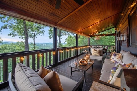 Completely screened in porch with long range mountain views.
