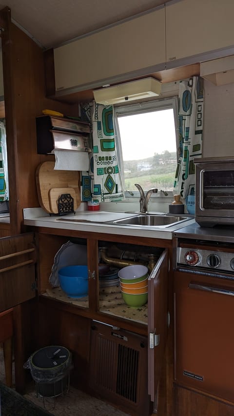 Pots, pans, bowls, cups, dishes forks, salt etc provided for your convenience