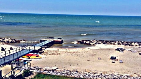 On the beach, sun loungers, beach towels