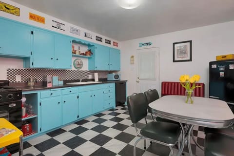 Full kitchen with stove, microwave, dishwasher.