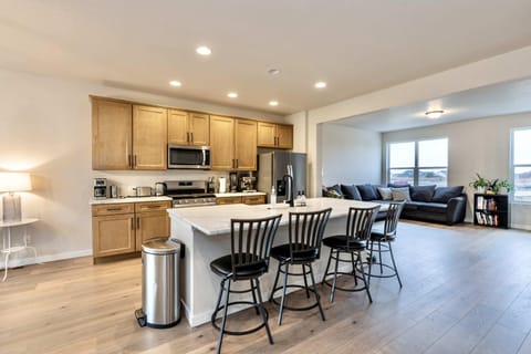 Bright and Airy Dining Area for your Stay enjoy family meals or morning coffee in this cozy, sunlit space. Ideal for home-cooked meals during your stay