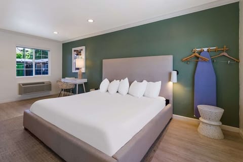 Relax in a calming room with modern art and soft lighting.