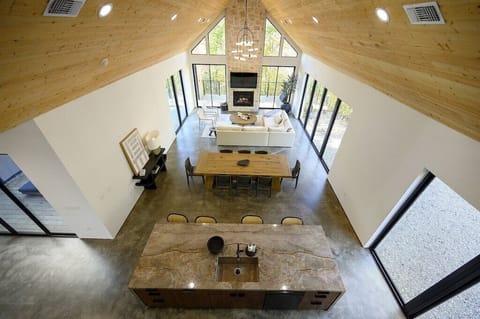 Living Room & Kitchen: Stunning views from a radiant space perfect for gatherings and relaxation!