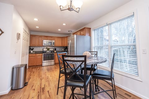 Full kitchen located on main floor. Washer and Dryer also located behind doors.