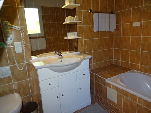 Shower, jetted tub, hair dryer, towels