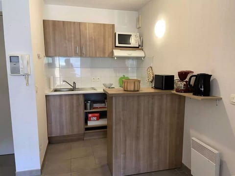 Fridge, microwave, cookware/dishes/utensils