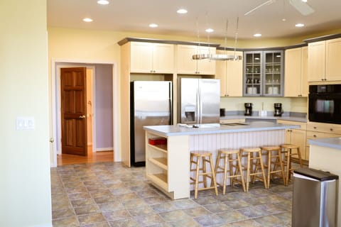 Fully stocked kitchen with seating at the island