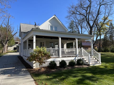 Updated home with spacious wraparound porch and free on-site parking
