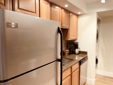 Kitchen is fully stocked with plates, pans, Keurig + brew coffee maker, and more