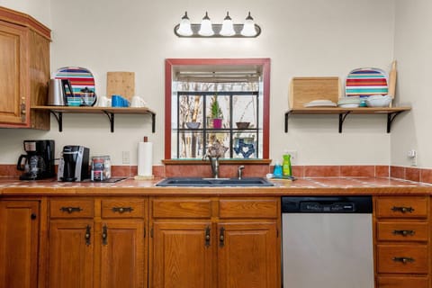 Let your inner culinary creativity loose in this well stocked kitchen full sized appliances.