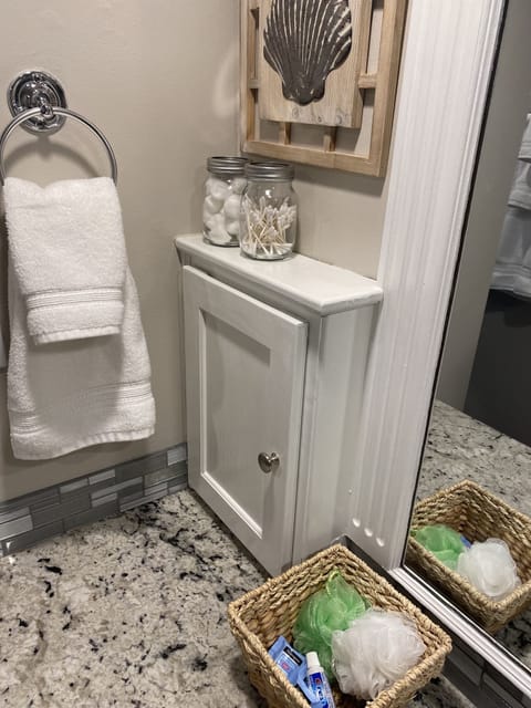 Combined shower/tub, hair dryer, towels, soap