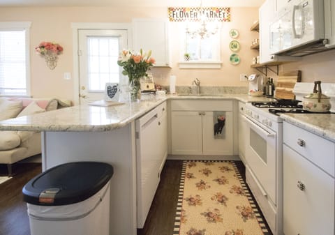 The kitchen has a gas stove, newer dishwasher and everything you need.
