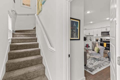 Step into style through our welcoming entryway and stairwell leading into your relaxing retreat.