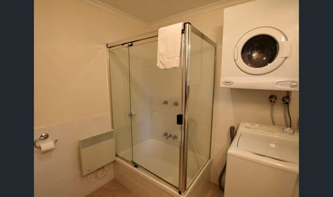 Combined shower/tub, hair dryer, towels, soap