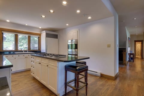 A large island with seating, perfect for chatting while cooking.